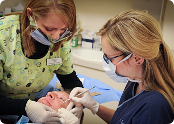 Dr. Erin Reid performing Mohs Surgery at Dermatology Associates of the Tri-Cities